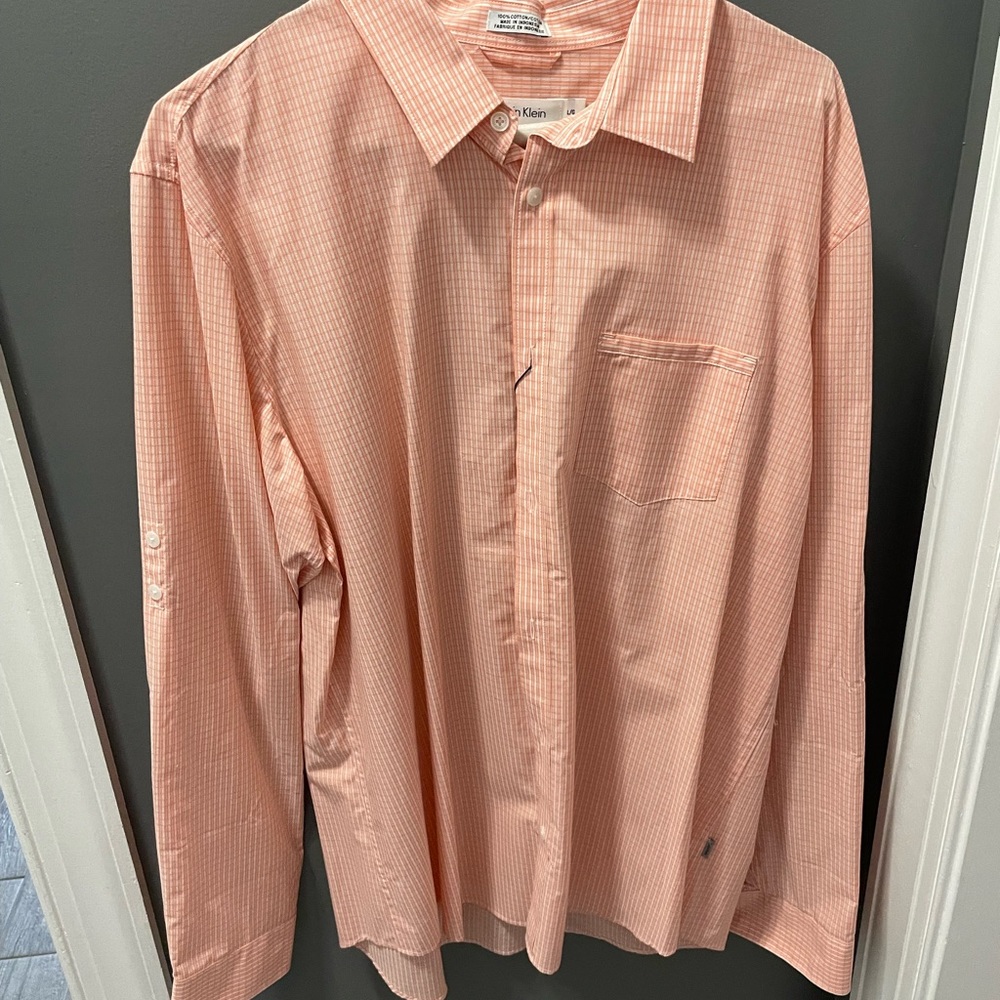 New Calvin Klein peach pattern shirt.